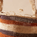 Close up view of woven striped bag