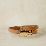 brown leather bracelet with brass elephant and brass buckle closure
