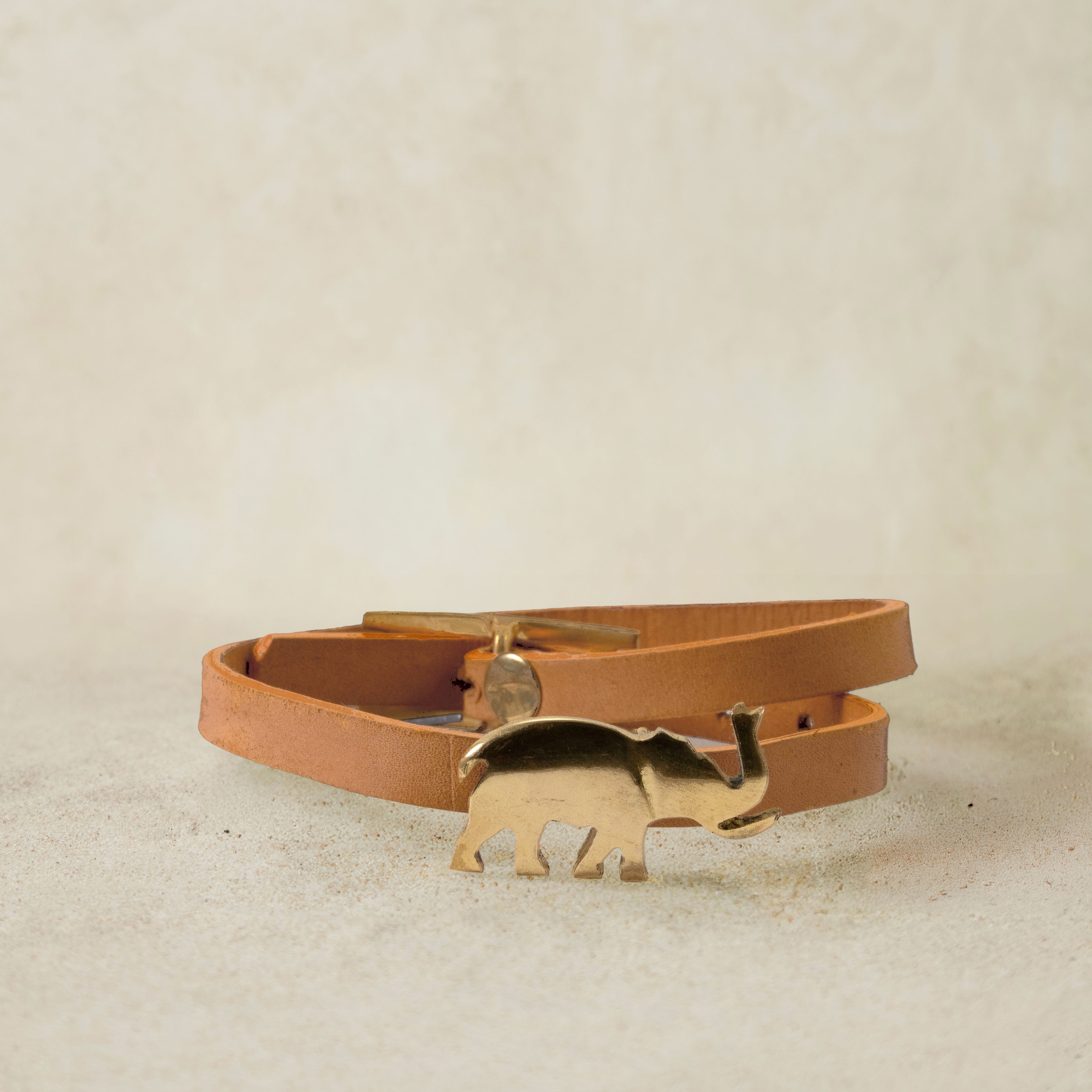 brown leather bracelet with brass elephant and brass buckle closure